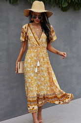 Robe cache-cœur à manches flottantes de style bohème